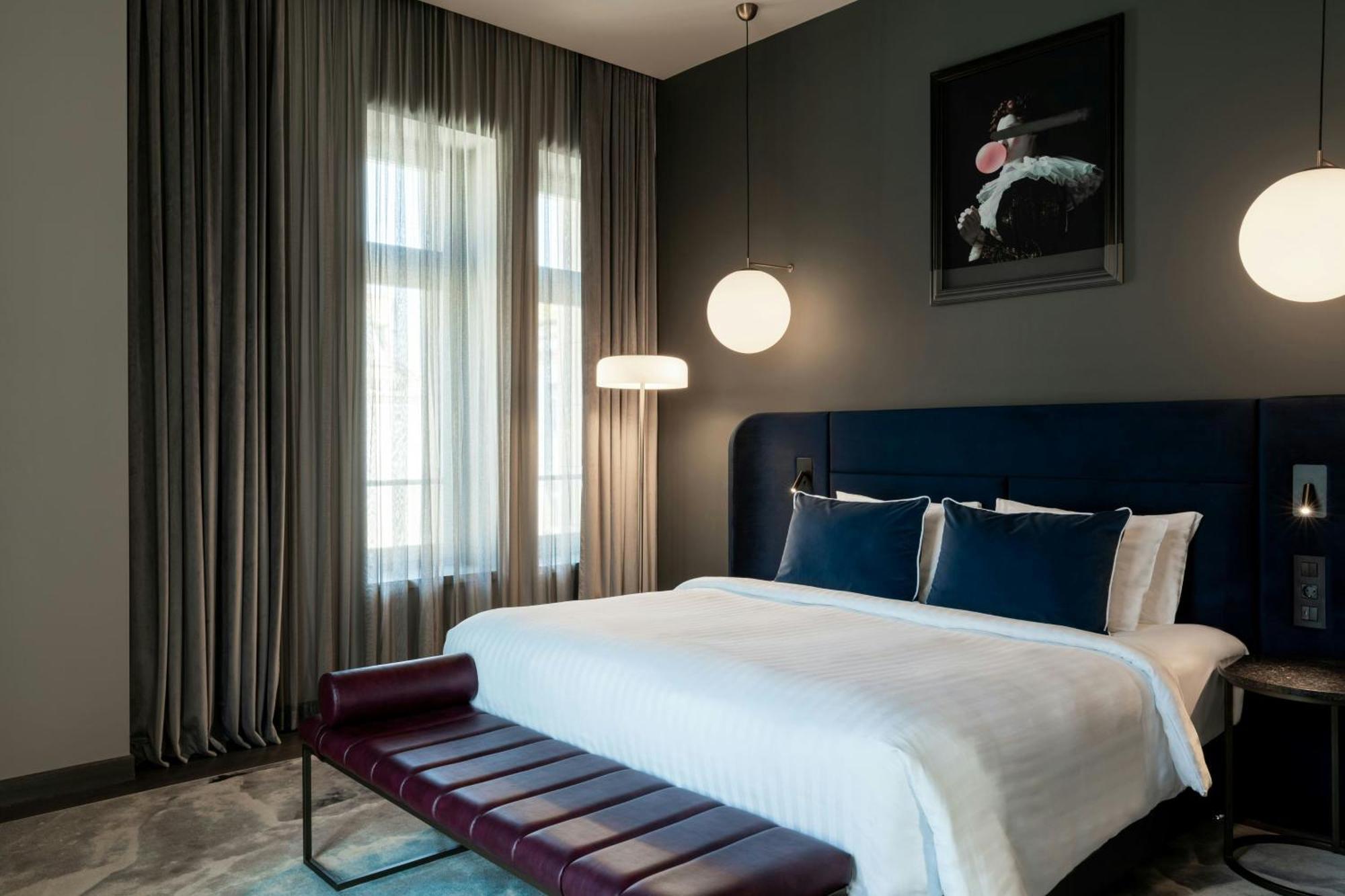The Marmorosch Bucharest, Autograph Collection 호텔 외부 사진 A bedroom at the hotel